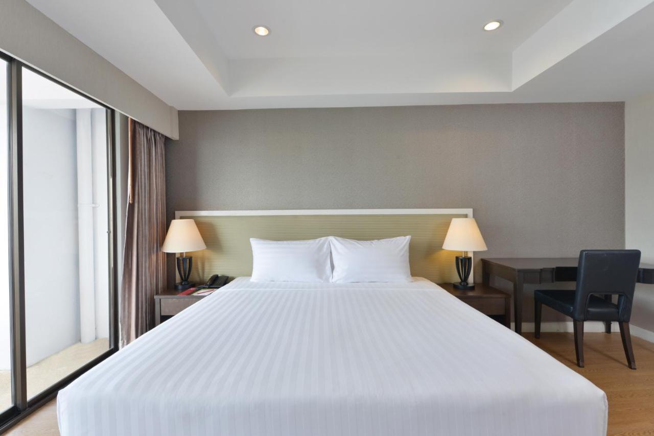 D Varee Jomtien Beach, Pattaya Kültér fotó A bedroom at the hotel